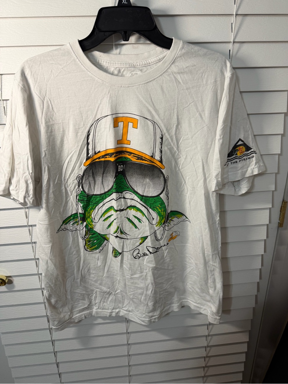 White Graphic Tee with Green & Yellow Illustration bass pro shop